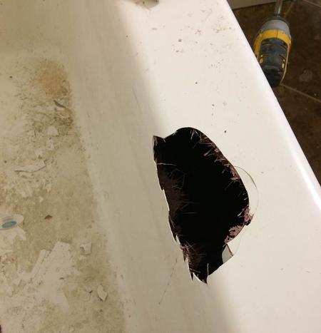 Hole in side of bathtub